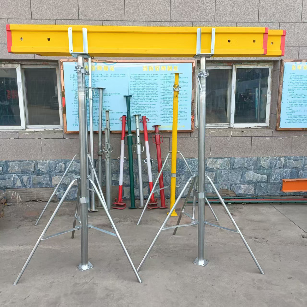 H20 timber beam supported by adjustable steel props and U-heads
